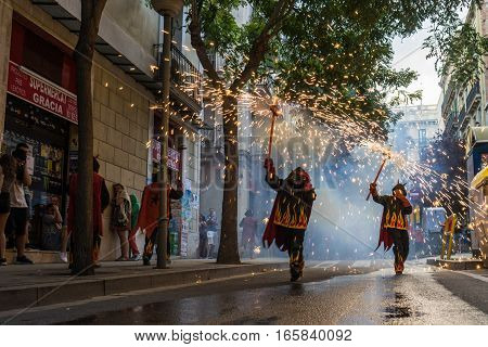 BarcelonaSpain Aug21: Fireworks in Gracia Barcelona's district during the traditional fire run.