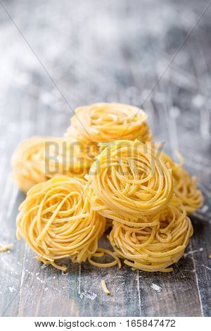 raw pasta noodles cooking on a table