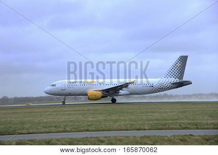 March 27th 2015 Amsterdam Schiphol Airport EC-KMI Vueling Airbus A320-216 Polderbaan Runway