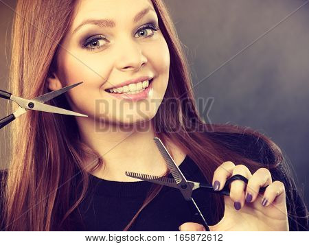 Female Hairstylist Barber With Scissors.