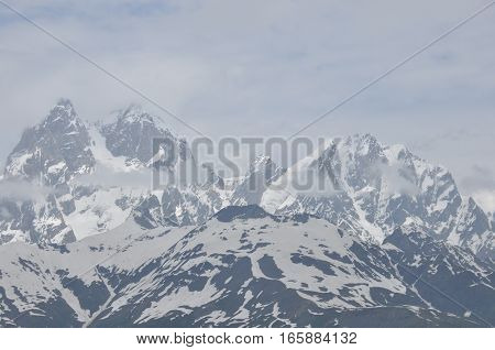 Ushba peak in the Caucasus Mountains. Snowy playing.