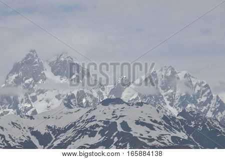 Ushba peak in the Caucasus Mountains. Snowy playing.