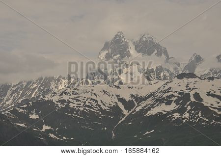 Ushba peak in the Caucasus Mountains. Snowy playing.