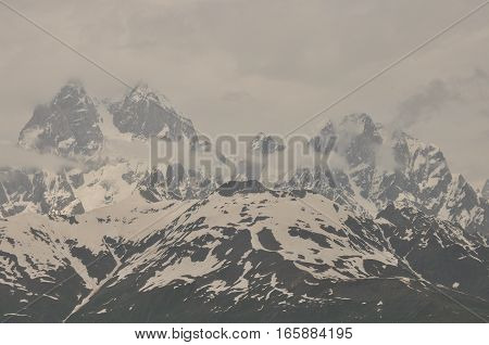 Ushba peak in the Caucasus Mountains. Snowy playing.