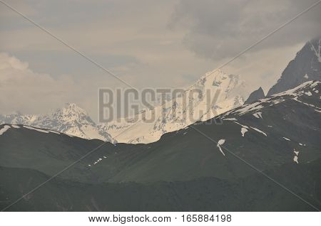 Ushba peak in the Caucasus Mountains. Snowy playing.