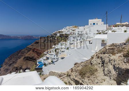 Santorini Greece - 12  August 2016: Santorini island at the sunset. A viewpoint from Imerovigli village in Greece