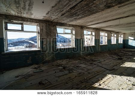 Interior of old ruined prison barrack in Kolyma