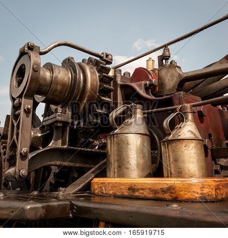 Close detail on the visible mechanism of an old English steam traction engine.