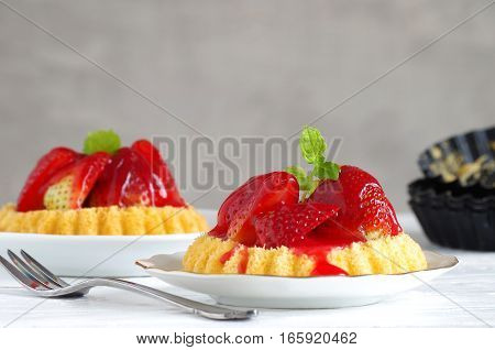 fresh homemade strawberry cake with peppermint leafes