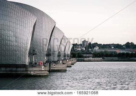 A view along the Thames flood barrier which runs across the river in East London.