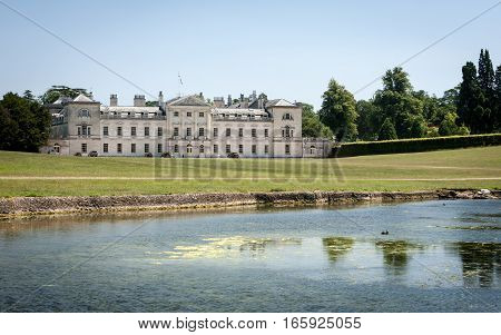 WOBURN, UK - JULY 15 2006: A view of the front of Woburn Abbey a country house to the Duke of Bedford originally dating back to 1145.