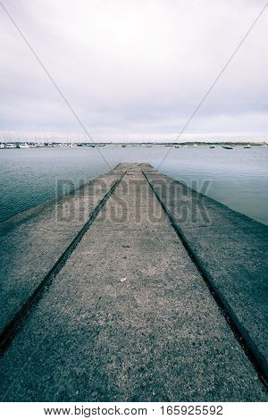 Boat slipway ramp at a small marina near Malahide Ireland.