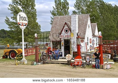 ROLLAG, MINNESOTA, Sept 1. 2016: The Tydol filling station with brand name signs, oil cans , and advertising signs are displayed at the West Central Steam Threshers Reunion in Rollag, MN attended by 1000's held annually on Labor Day weekend.
