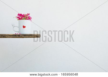 Minimalist White Mug Coffee And The Antigonon Leptopus  Flower.