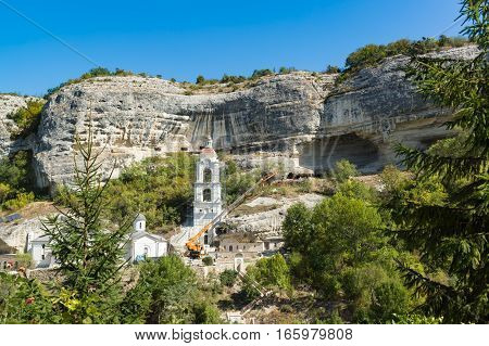 BAKHCHYSARAY CRIMEA RUSSIA - SEPTEMBER 13.2016: The construction of the temple on the territory of the Holy Dormition cave monastery