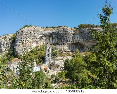 BAKHCHYSARAY CRIMEA RUSSIA - SEPTEMBER 13.2016: The construction of the temple on the territory of the Holy Dormition cave monastery