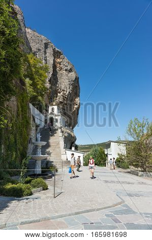 BAKHCHYSARAY CRIMEA RUSSIA - SEPTEMBER 13.2016: The current bell tower of the Holy Dormition cave monastery in the natural boundary of Mariam-Dere (Canyon of Maria).