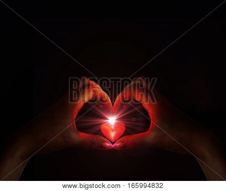 hands folded in the shape of heart lumience