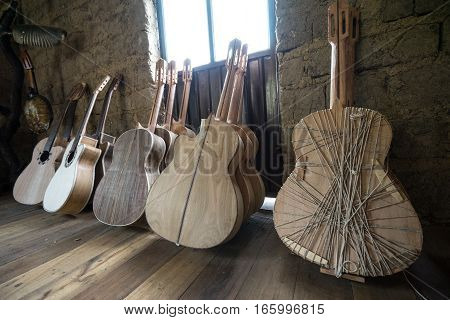July 22, 2016 San Bartolome, Ecuador: classical guitars in various finishing stages in small rural luthier shop