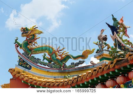 Chinese Dargon Phoenix and Crane on Taoist Temple Tiled Roof