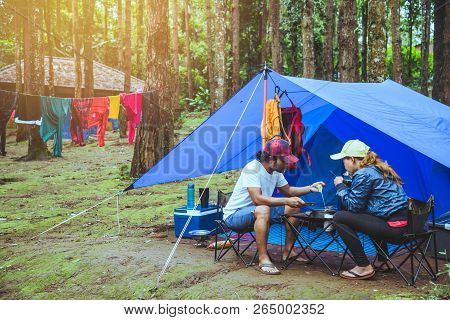 Lover Asian Man And Asian Women Travel Nature Travel Relax In The Holiday. Camping On The Mountain.