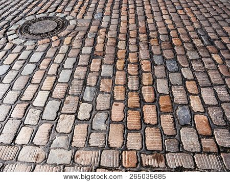Coblestone And Manhole In Central Hamburg, Germany
