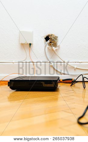 Modern Blue Toned New Modern Fiber Optic Installation At Home With Obsolete Catv And New Ftth Fiber 