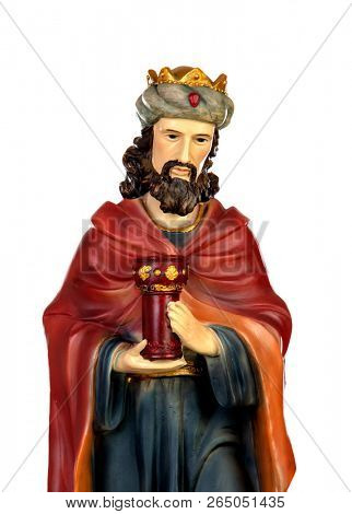Gaspar, one of the three wise men. Ceramic figure isolated on white background