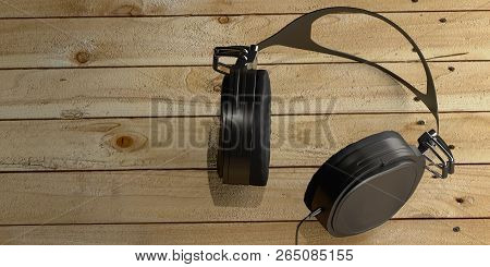 Mock Up Black Headphone On Wooden Bacground. 3d Rendering