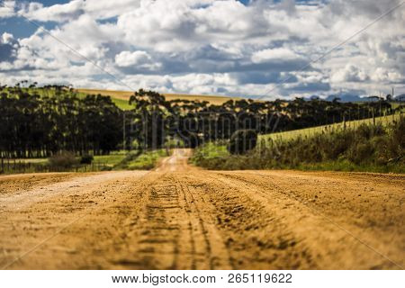 Dirt Road Through Agricultural Fields In Napier, Western Cape, South Africa.