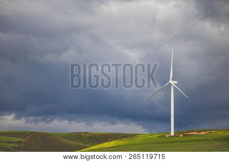 Dramatic Thunderstorm Over Wind Turbine In Green Fields - Caledon, Western Cape, South Africa.