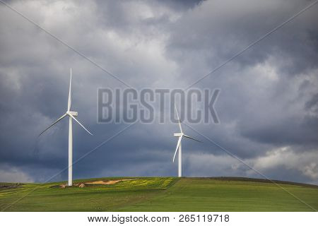 Dramatic Thunderstorm Over Wind Turbines In Green Fields - Caledon, Western Cape, South Africa.