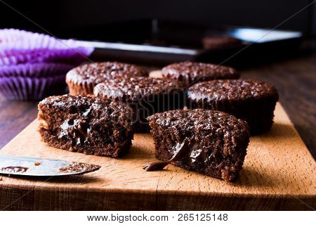 Mini Chocolate Cake Souffle On Wooden Surface.