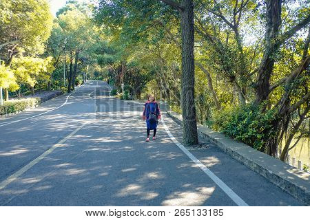 Beautiful Senior Asian Women Walking In The Xiqiao Mountain Park Foshan China,china Travel