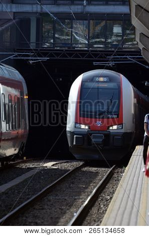 Platform and train view on Oslo central station. Oslo Central Station (Sentralstasjon) is main railway station in Oslo. June 17. 2018. Oslo,Norway