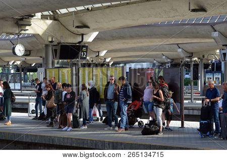 Platform and train view on Oslo central station. Oslo Central Station (Sentralstasjon) is main railway station in Oslo. June 17. 2018. Oslo,Norway