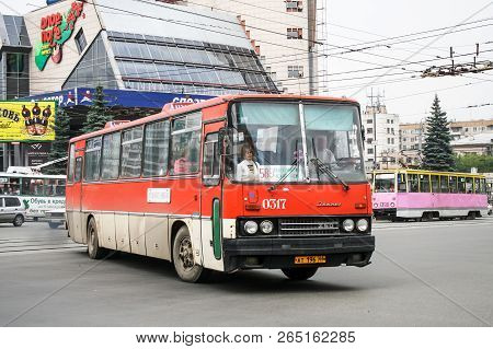 Chelyabinsk, Russia - July 2, 2008: Red Interurban Bus Ikarus 250 In The City Street.