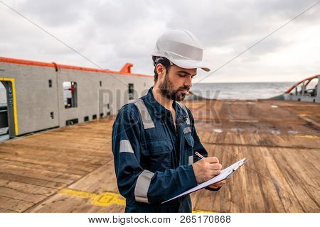 Marine Deck Officer Or Chief Mate On Deck Of Vessel Or Ship