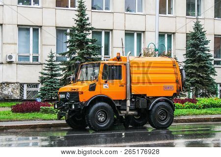 Ufa, Russia - September 15, 2008: Watering And Cleaning Machine Unimog U1400 In The City Street.