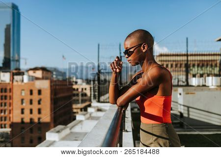 Skinhead girl at a LA rooftop