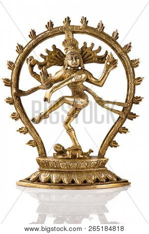 Bronze statue of indian hindu god Shiva Nataraja - Lord of Dance isolated on white with reflection