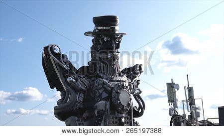 Robotic Droids Head And Shoulders. Footage. Droid Robot On Background Of Sky With Clouds. Technology