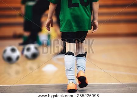 Kids Futsal Training. Indoor Soccer Players Training With Balls. Sport Background. Indoor Soccer Spo