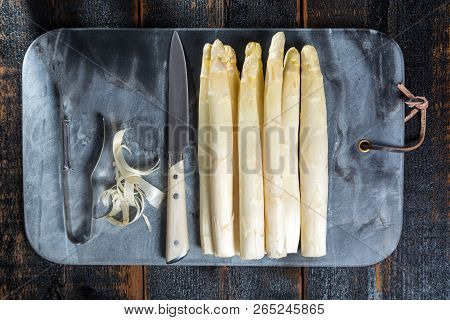Top View, Fresh Tasty White Asparagus, Seasonal Vegetable, New Harvest, With Piller And Knife, Ready