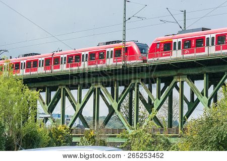 Essen Kettwig, Nrw, Germany - April 28, 2016:
Express Train Crossing The Railway Bridge In Essen Ket