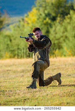 Man Rifle For Hunt. Mental Preparation For Hunting Individual Process. Hunter Khaki Clothes Ready To