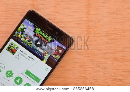 Bekasi, West Java, Indonesia. October 27, 2018 : Zombie Tsunami Dev App On Smartphone Screen. Zombie