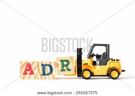 Toy Forklift Hold Wood Letter Block A To Complete Word Adr (abbreviation Of Adverse Drug Reaction) O