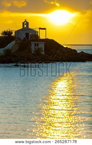 Agios Fokas Near Monemvasia In Stormy Weather Overcast Sky, Sunrise. Small Cemetery On Sea Shore, Ma