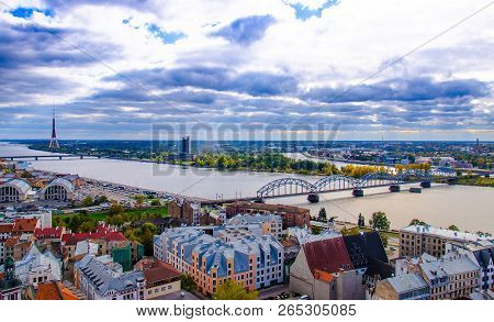 Panorama View Of Riga Cityscape Old Town, Riga Radio And Tv Tower And River Daugava With Bridges Fro